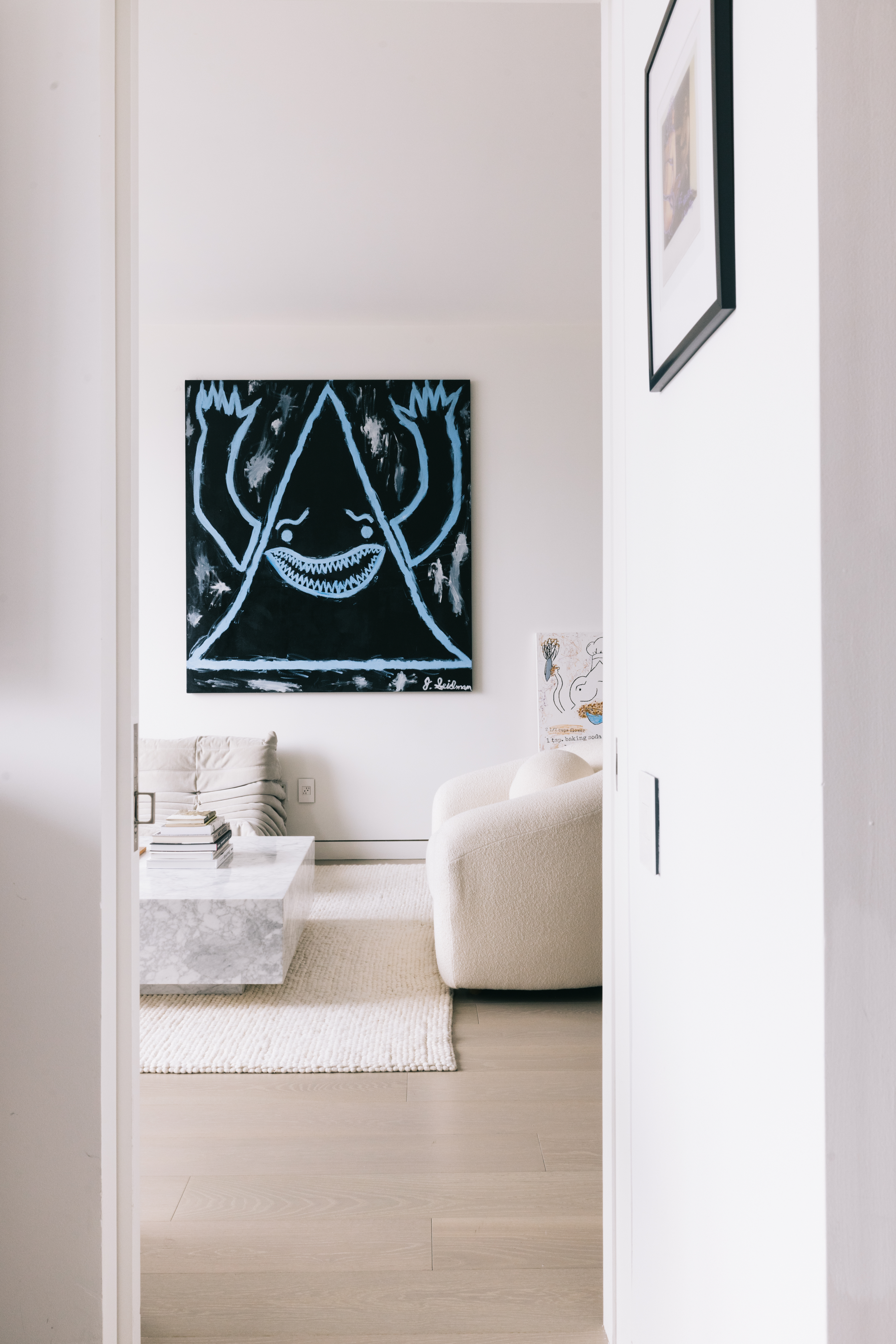 255 Hudson Street, Unit 9C Manhattan, NY 10013 - Photo 4 of 19 a bathroom with a sink and a mirror