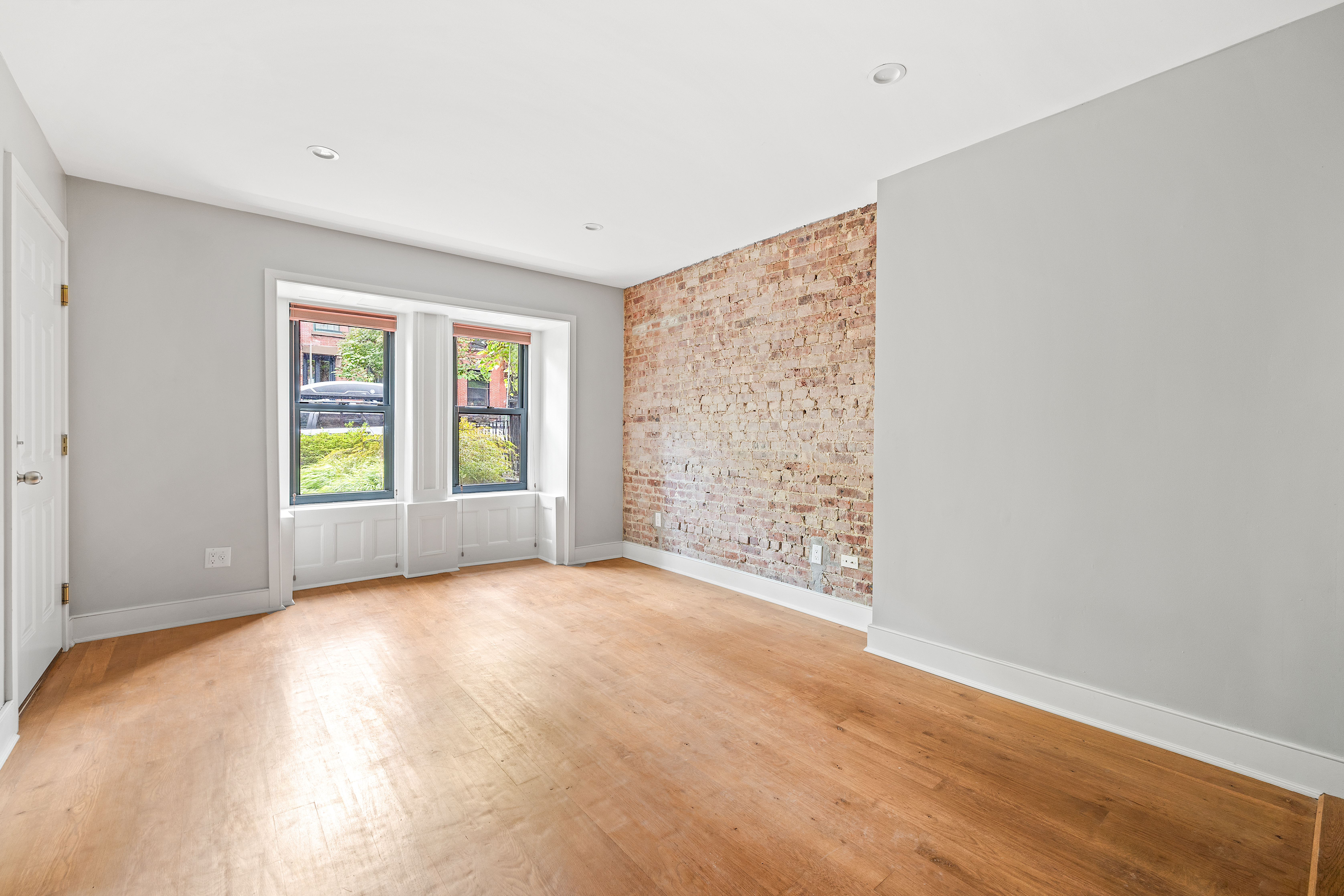 272 Prospect Place, Unit GARDEN Brooklyn, NY 11238 - Photo 2 of 8 a view of an empty room with window