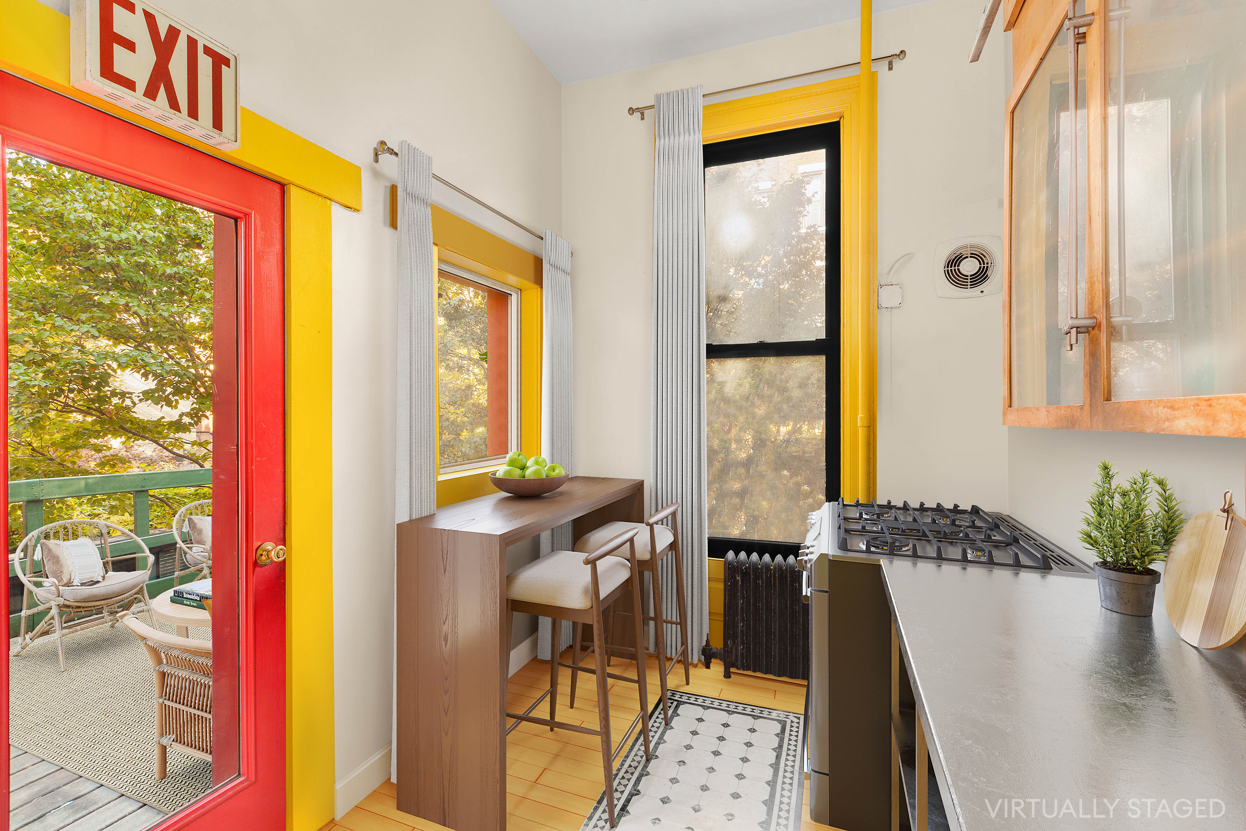 117 West 120th Street Manhattan, NY 10027 - Photo 14 of 31 a view of a living room with a large window and wooden floor