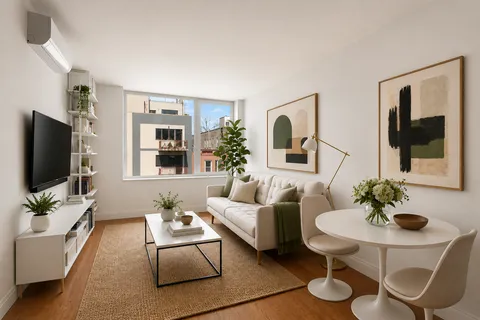 a kitchen with a table and chairs