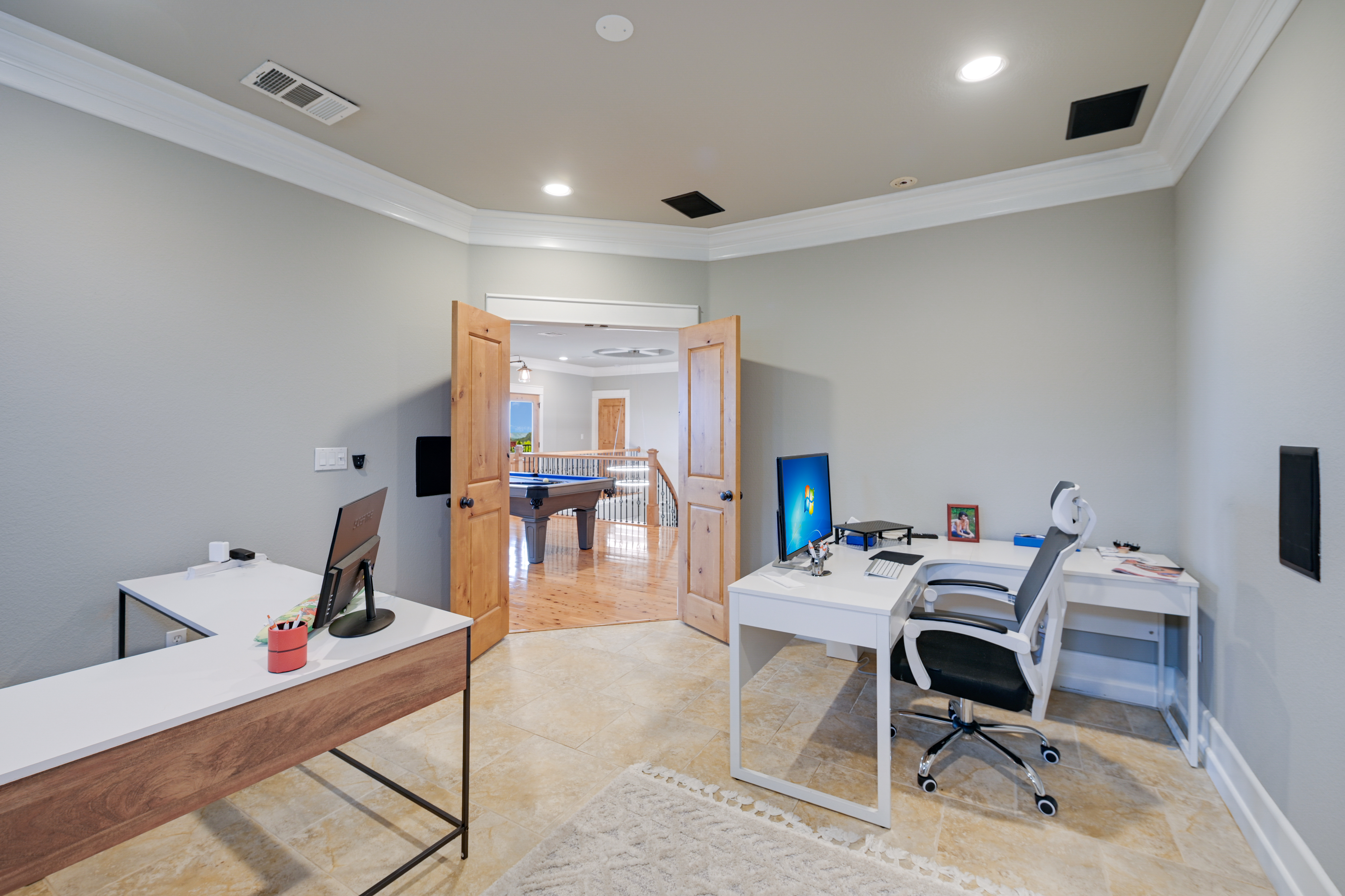 14913 Murfin Road Austin, TX 78734 - Photo 13 of 40 a work room with furniture and wooden floor