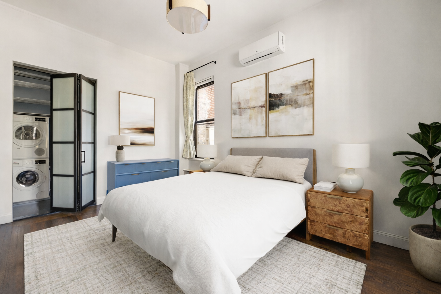 151 East 83rd Street, Unit PHC Manhattan, NY 10028 - Photo 10 of 16 a bedroom with a bed and a potted plant