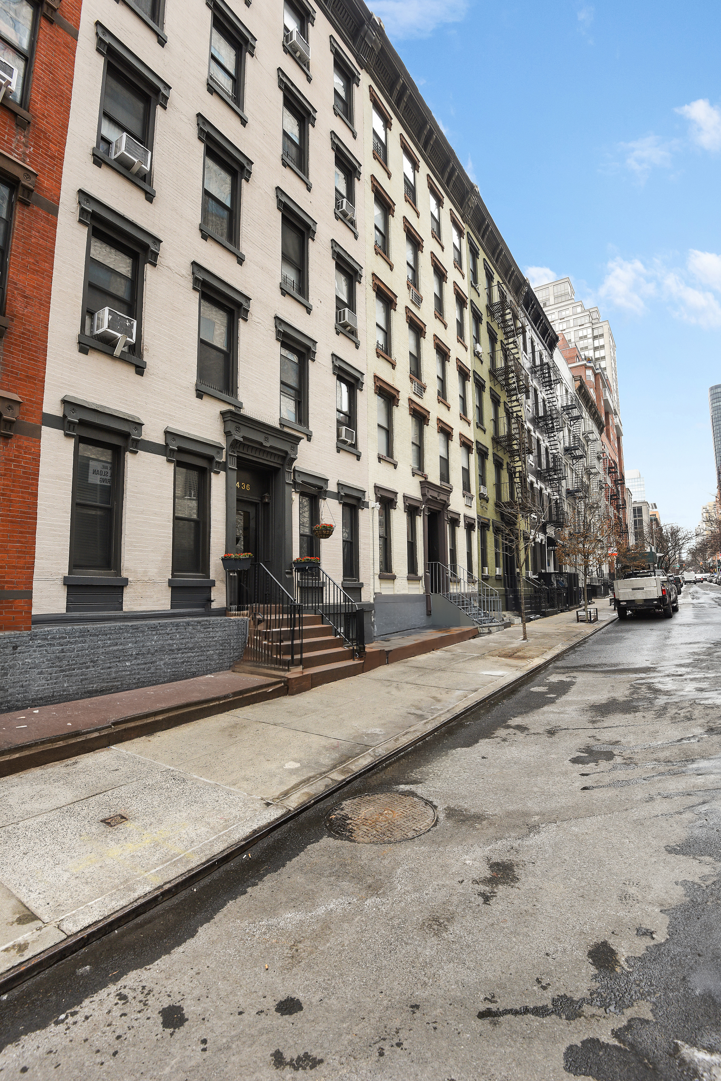 436 East 66th Street, Unit 1W Manhattan, NY 10065 - Photo 17 of 19 a view of a building with a street