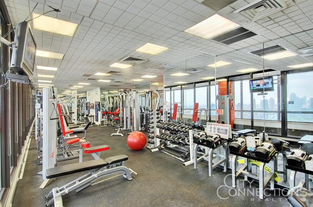 630 1st Avenue, Unit 10A Manhattan, NY 10016 - Photo 5 of 9 a view of a room with gym equipment