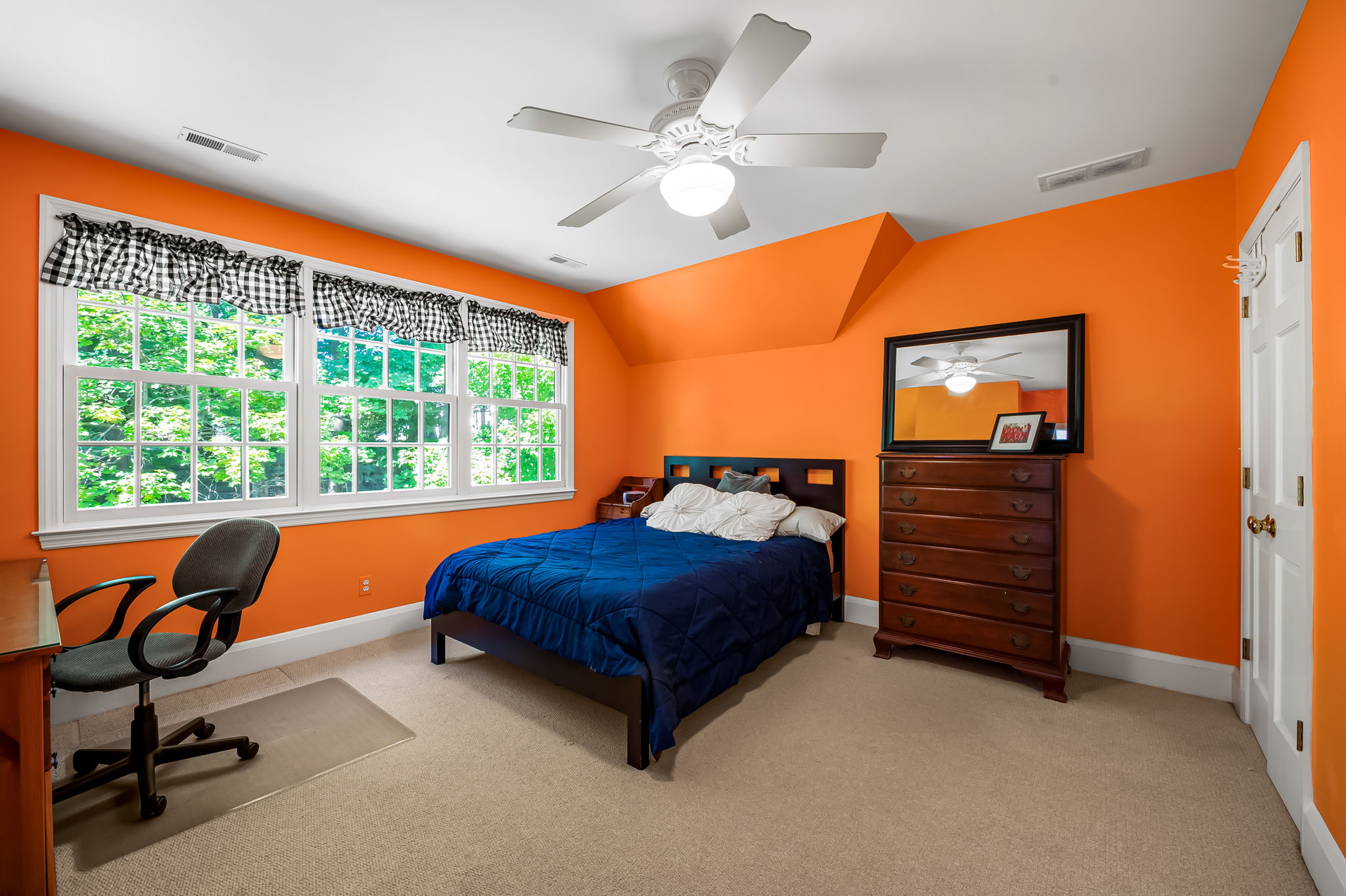 910 Army Road Towson, MD 21204 - Photo 39 of 62 a bedroom with a bed and a dresser next to a window