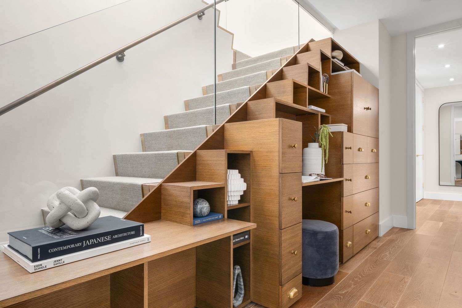 a view of living room with furniture and wooden floor