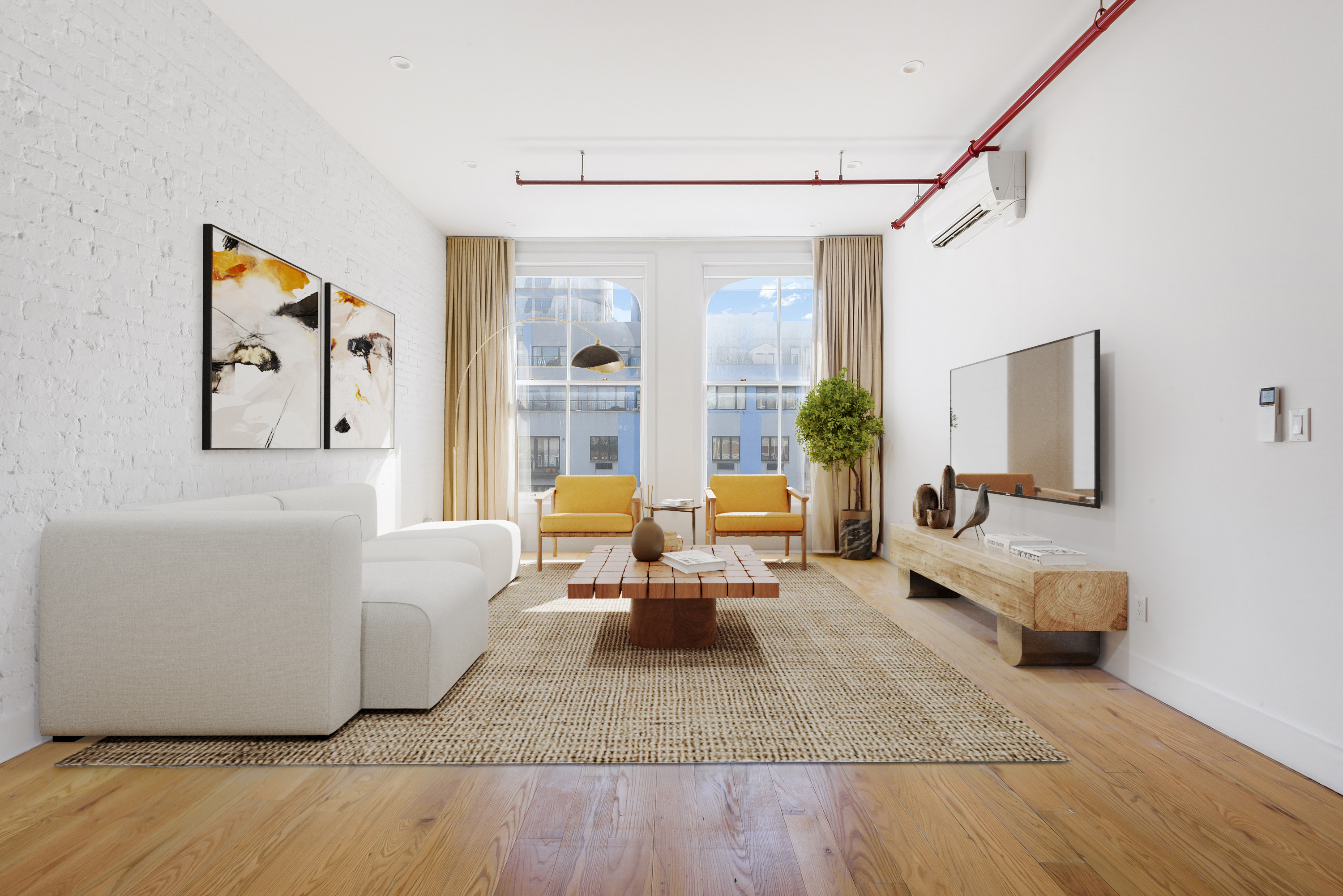 a living room with furniture and a flat screen tv