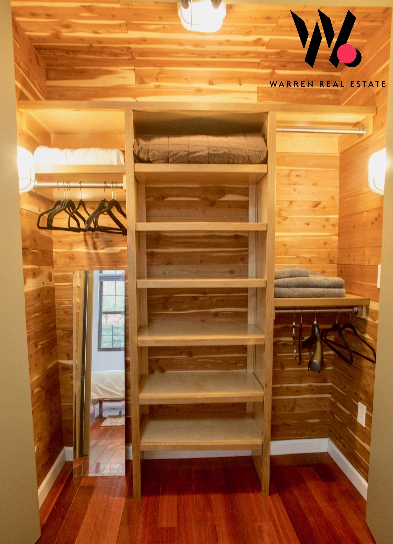 153 Stanton Street, Unit A1 Manhattan, NY 10002 - Photo 15 of 16 a view of walk in closet with empty racks