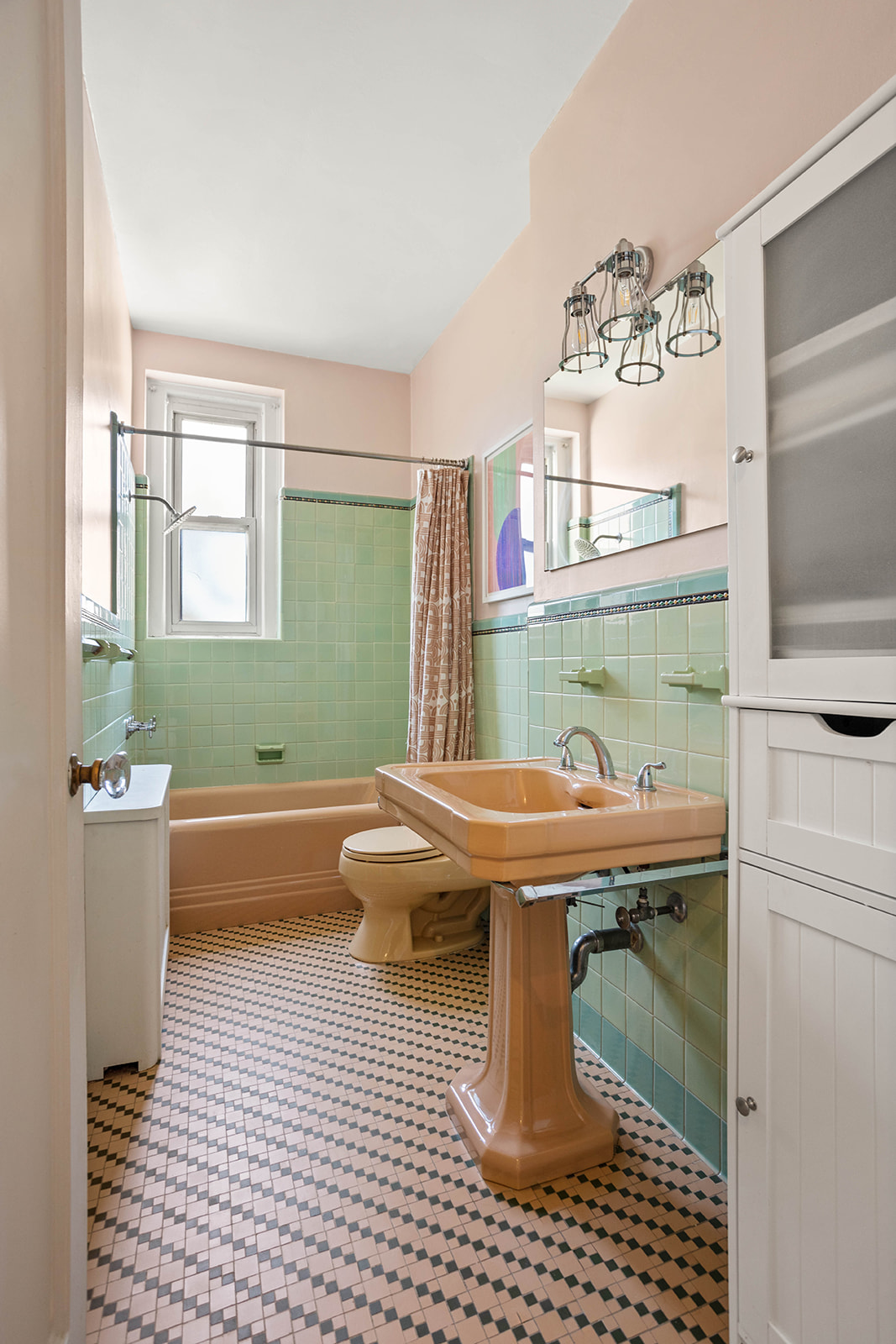 34-28 80th Street, Unit 41 Queens, NY 11372 - Photo 11 of 15 a bathroom with a sink a toilet and bathtub