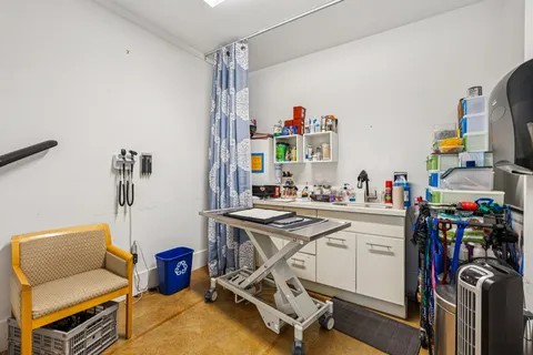 a view of a workspace with furniture