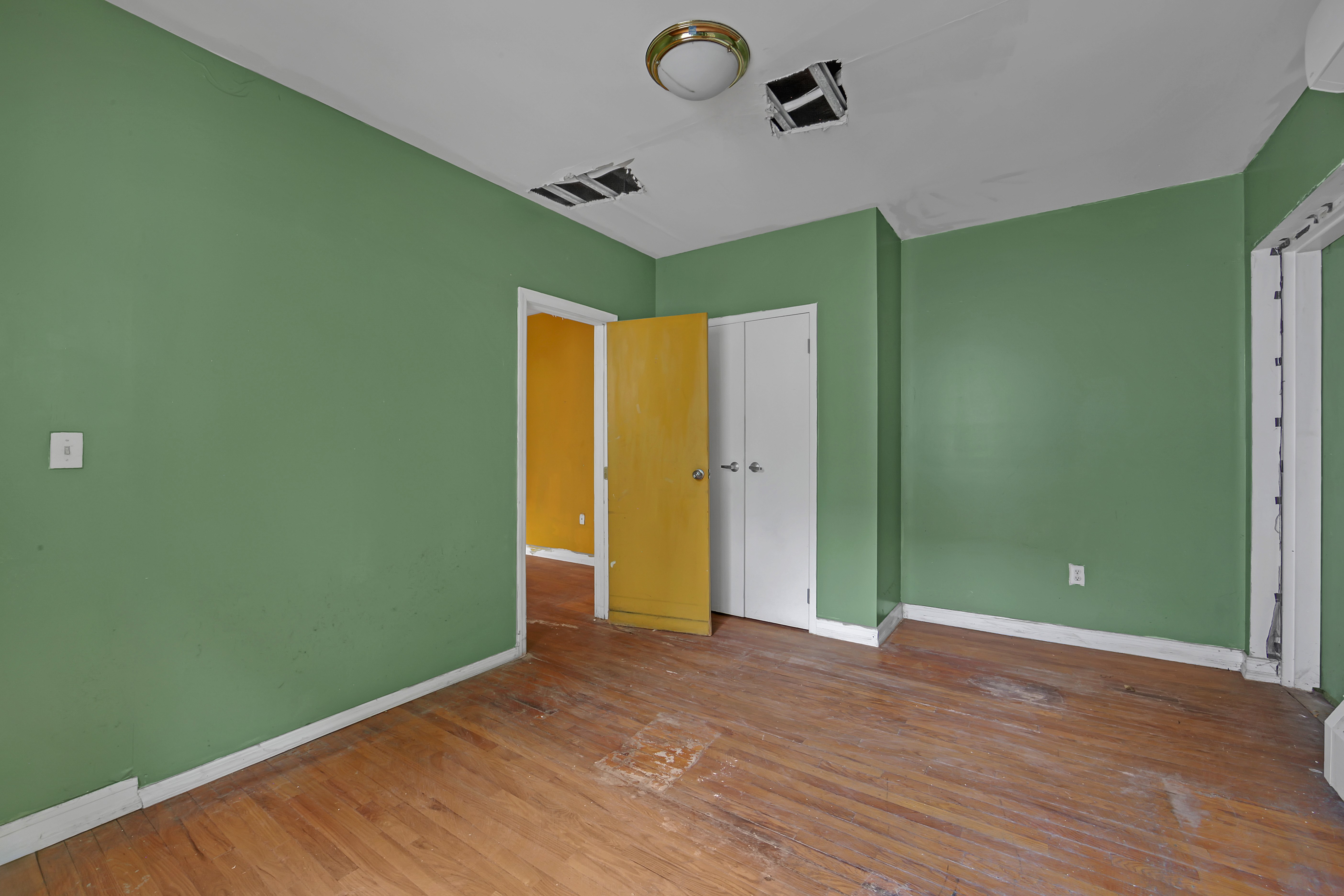 430 Lenox Avenue, Unit 1 Manhattan, NY 10037 - Photo 4 of 14 a view of a room with wooden floor