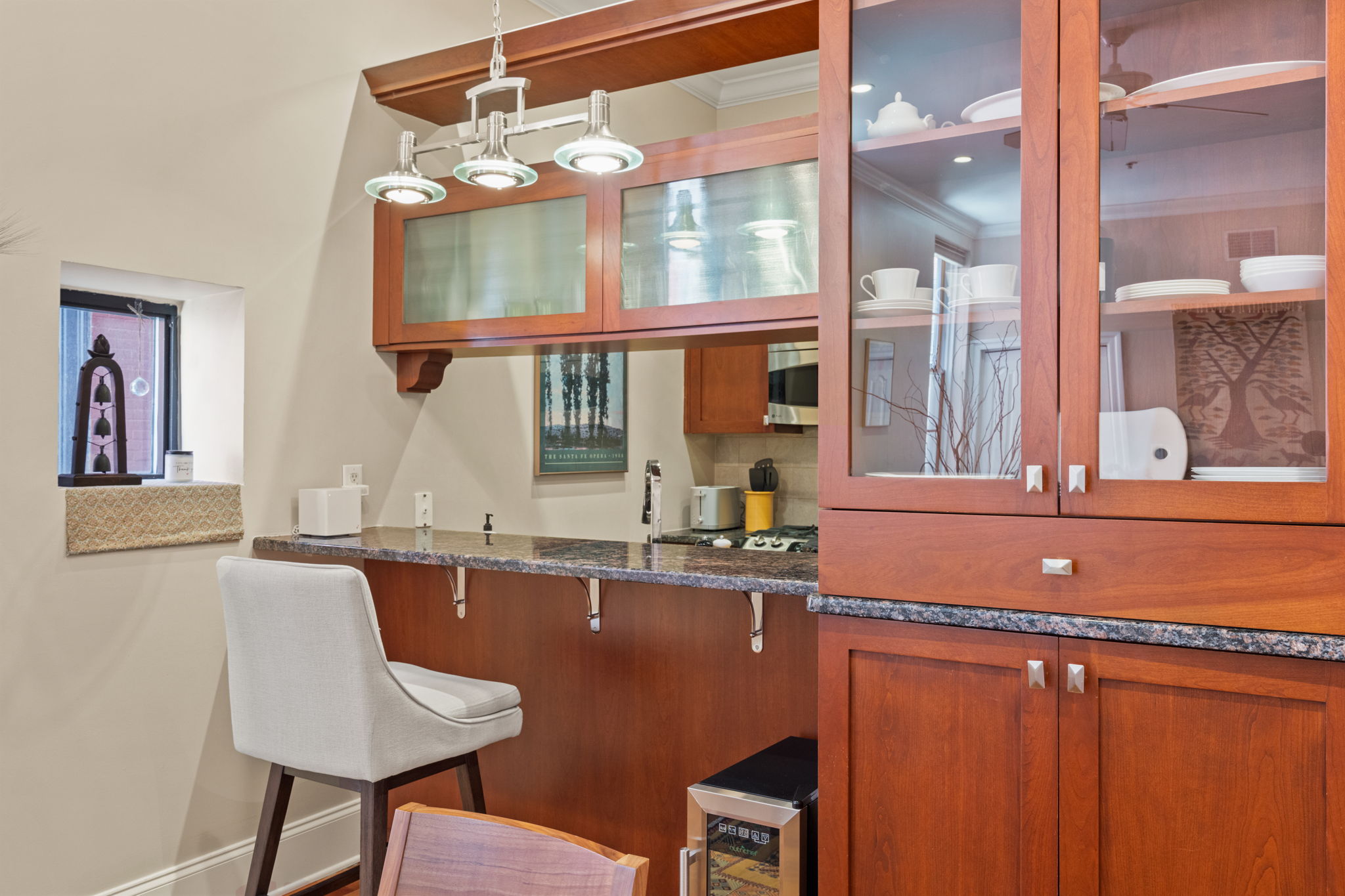 2049 Walnut Street, Unit 1R Philadelphia, PA 19103 - Photo 8 of 18 a room with a table chairs and a window