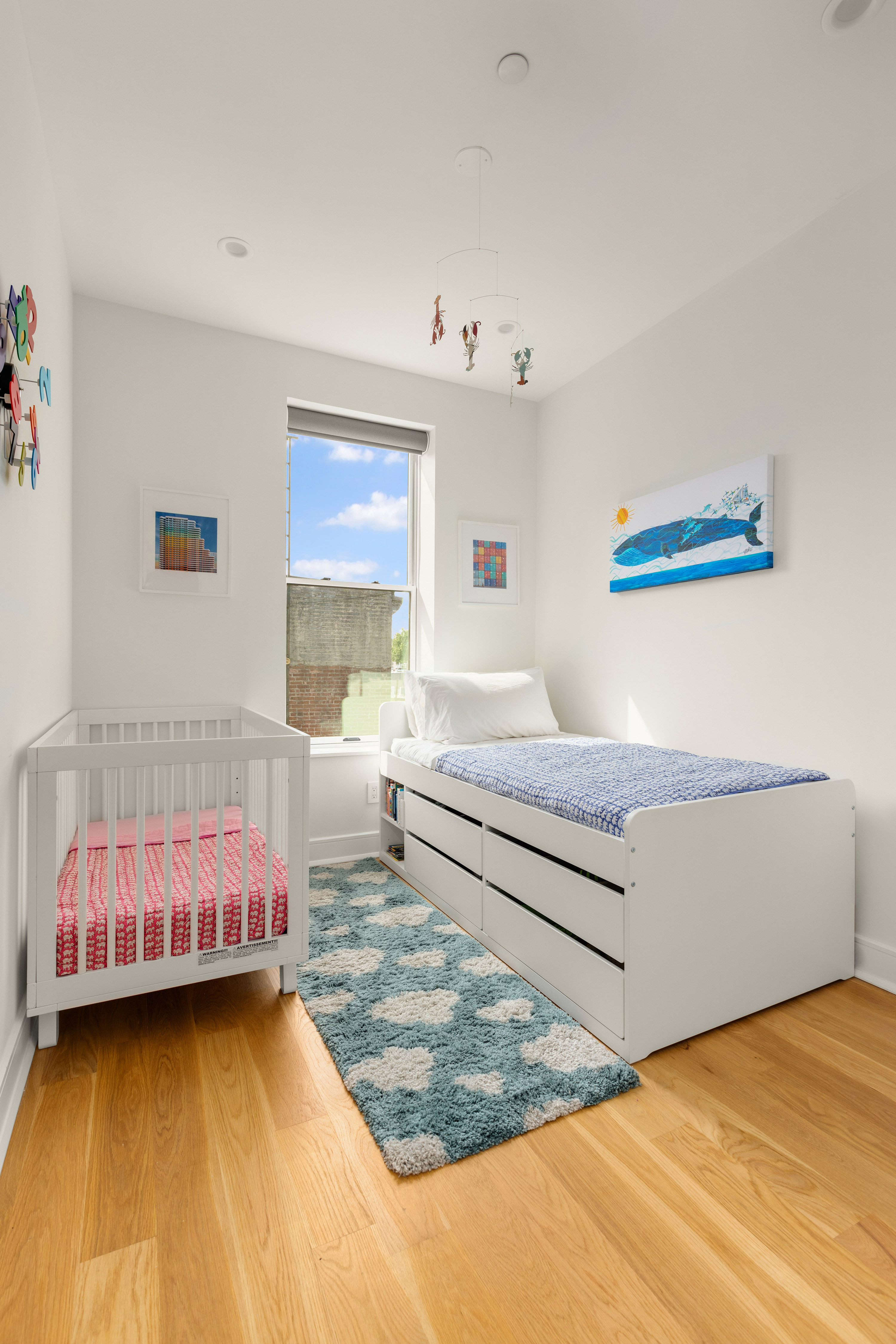 352 6th Avenue, Unit 3 Brooklyn, NY 11215 - Photo 10 of 14 a bedroom with a bed and a window