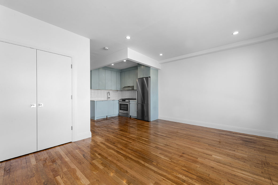 686 MacDonough Street, Unit 2A Brooklyn, NY 11233 - Photo 2 of 8 a view of kitchen with wooden floor