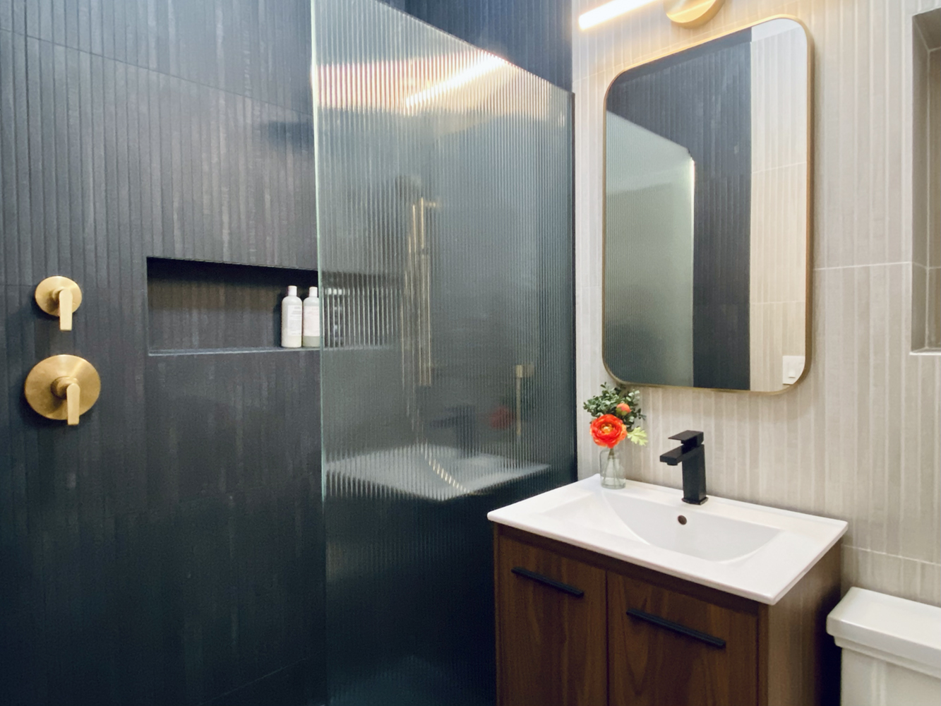 60 Court Street, Unit 2L Brooklyn, NY 11201 - Photo 7 of 9 a bathroom with a sink and a mirror