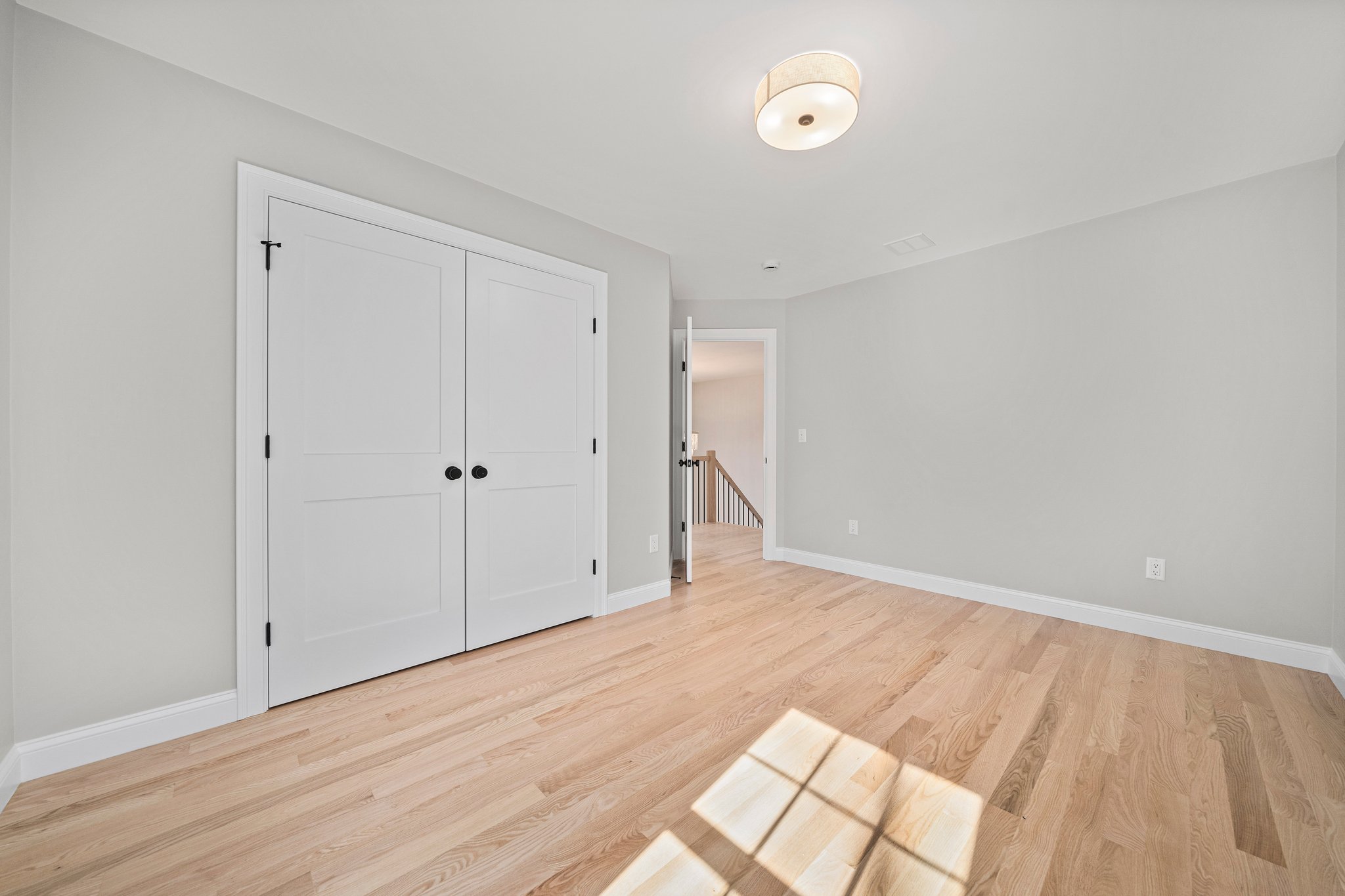 3 Everendon Road Canton, MA 02021 - Photo 28 of 35 a view of an empty room with wooden floor