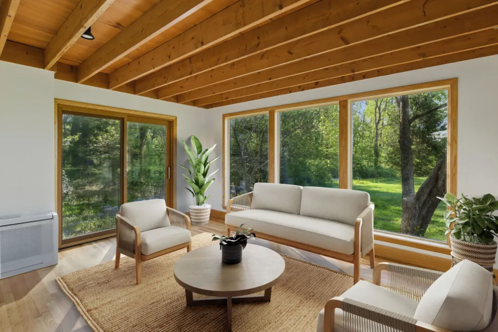 a living room with furniture and a floor to ceiling window