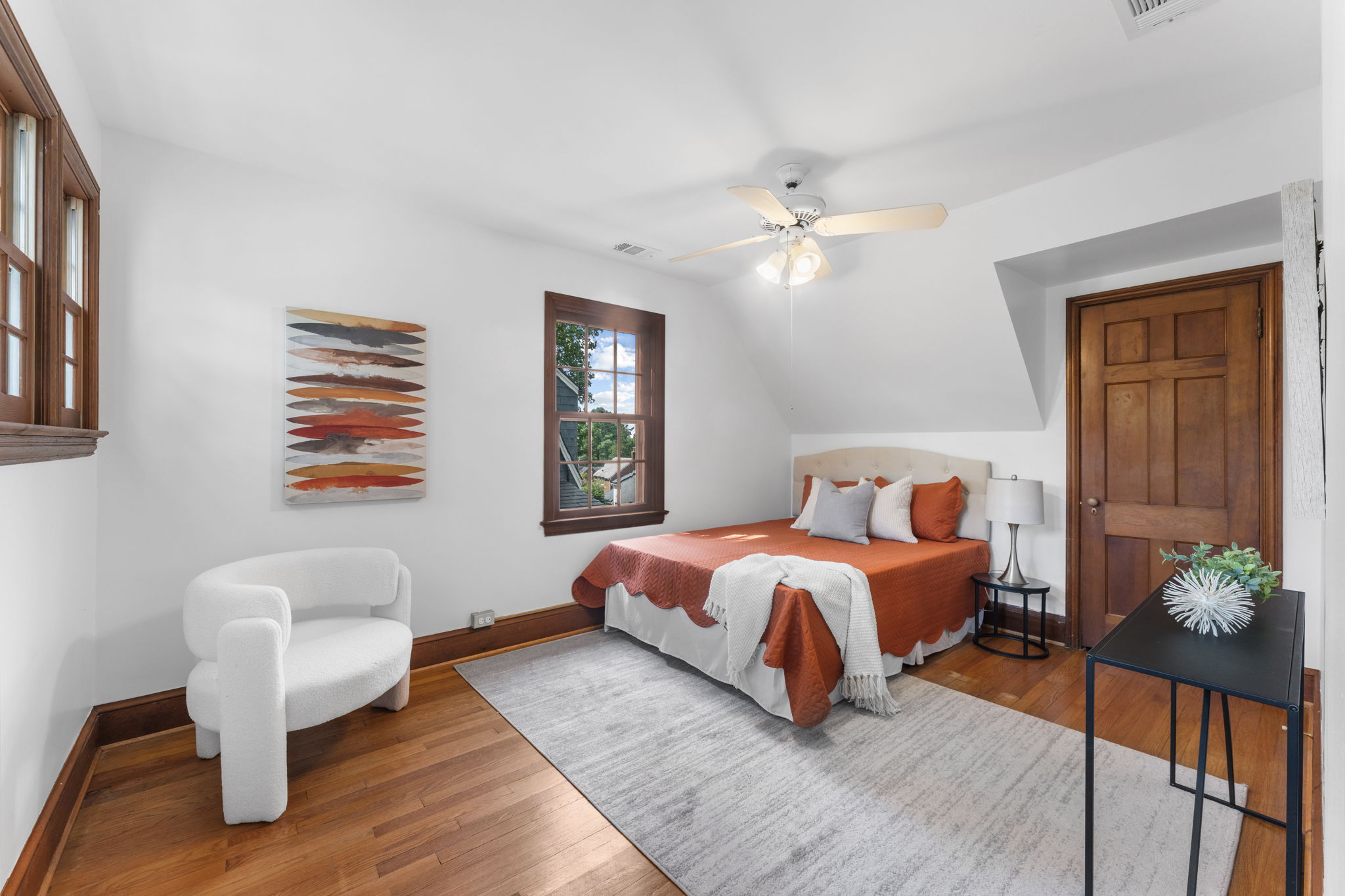 1325 Locust Road Northwest Washington, DC 20012 - Photo 32 of 56 a bedroom with a bed and a chandelier