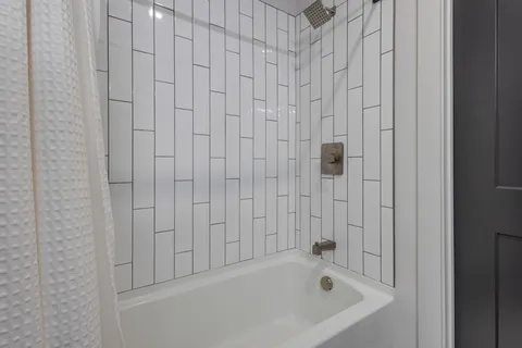 a bathroom with a bathtub