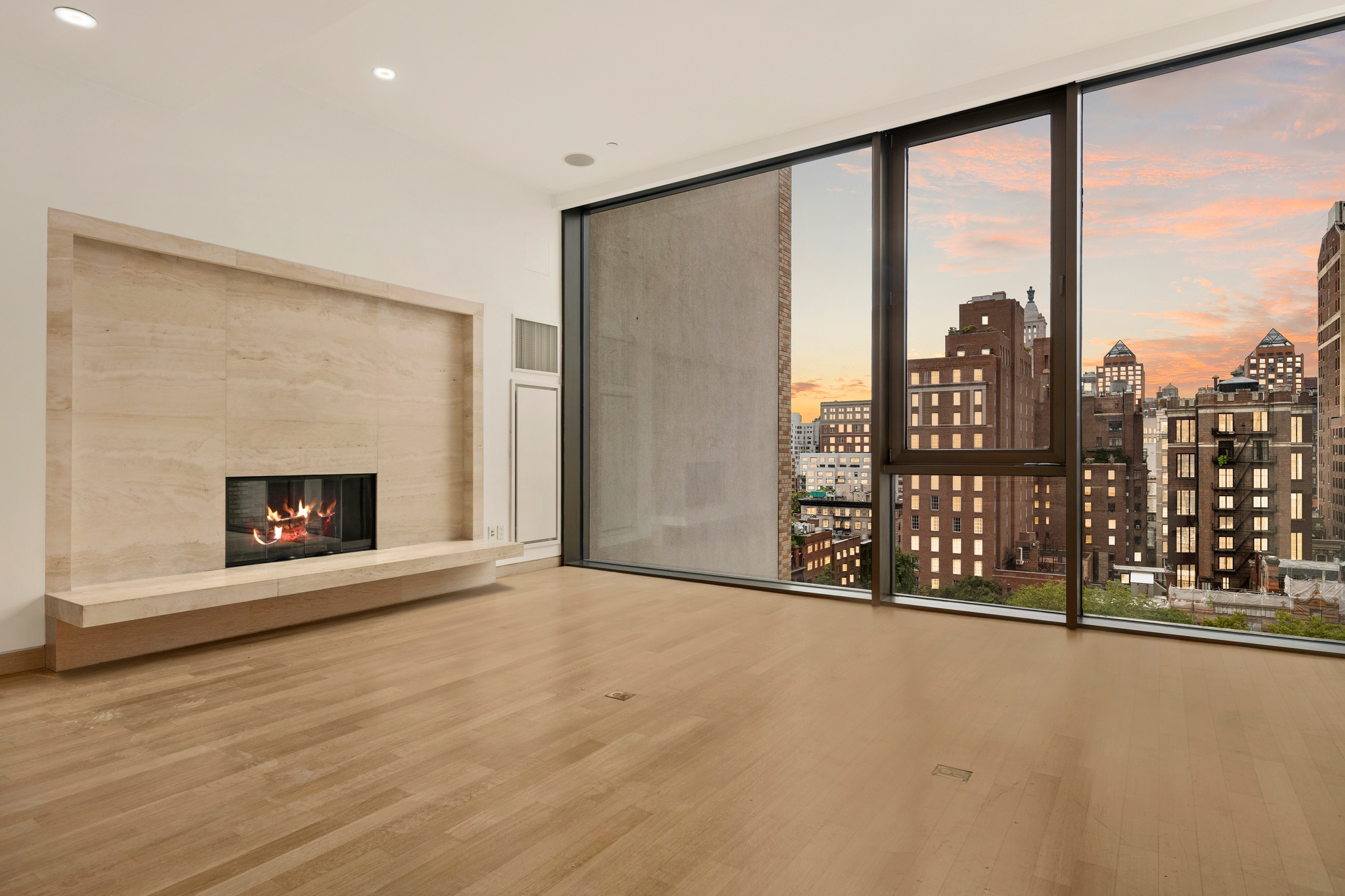 50 Gramercy Park North, Unit 15A Manhattan, NY 10010 - Photo 2 of 29 a view of an empty room with a fireplace and a window