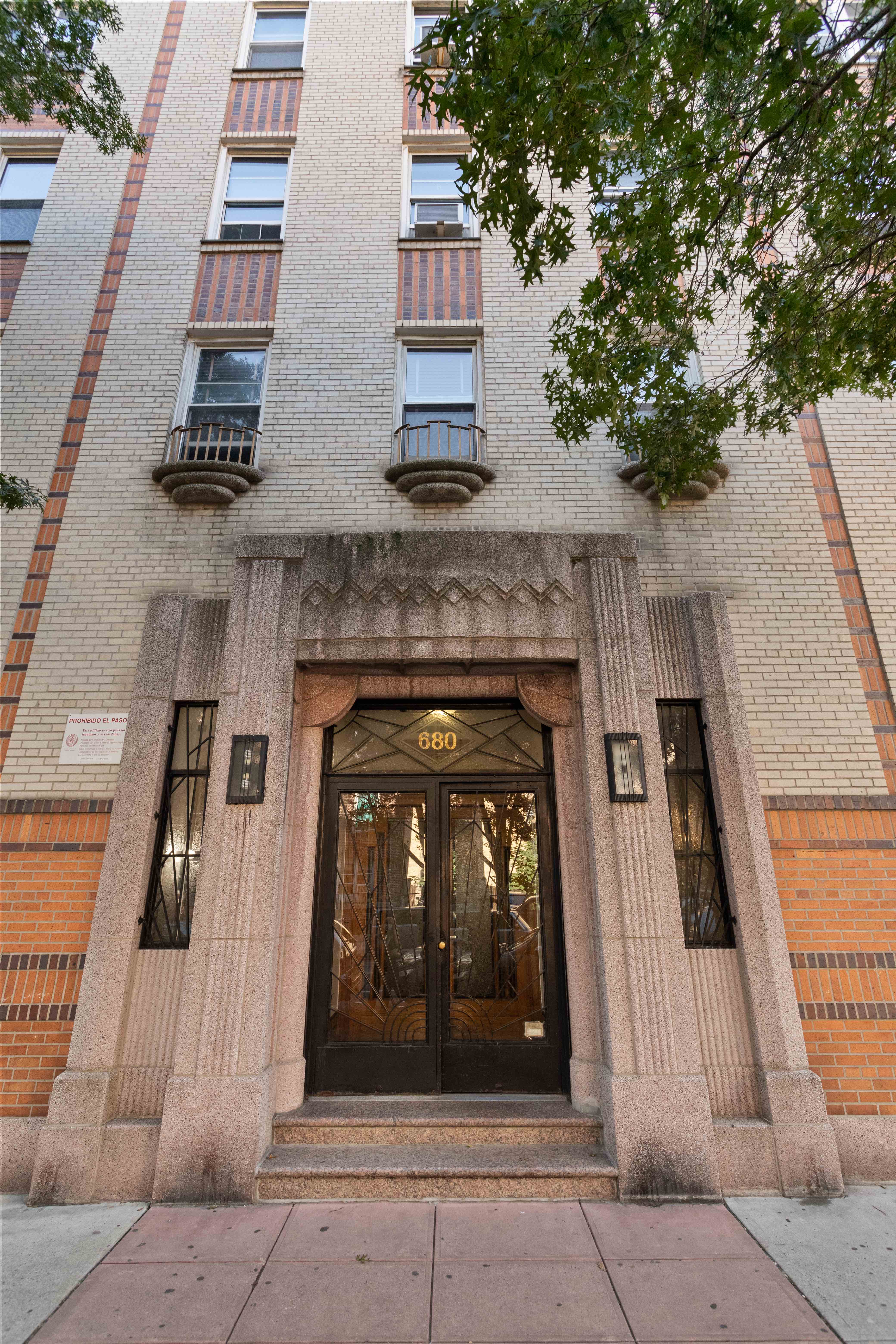 680 West 204th Street, Unit 5E Manhattan, NY 10034 - Photo 17 of 23 front view of a building