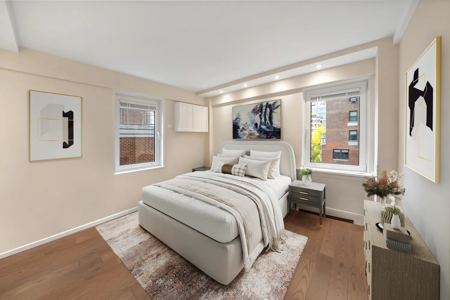 a bedroom with a large bed and a window