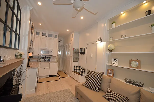 88 Horatio Street, Unit 1C Manhattan, NY 10014 - Photo 4 of 9 a large room with a couch