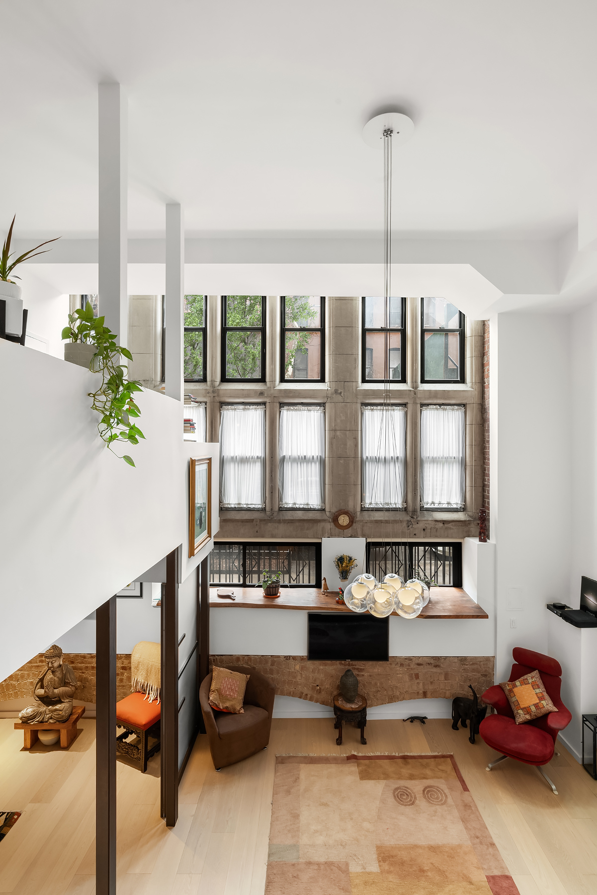 248 East 31st Street, Unit 1D Manhattan, NY 10016 - Photo 3 of 13 a living room filled with furniture and furniture