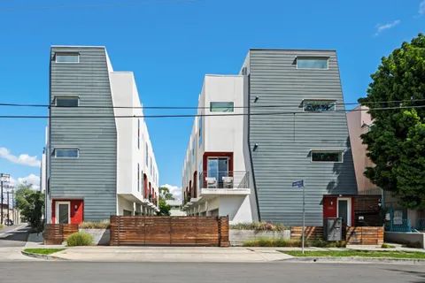 a front view of a house with a garage