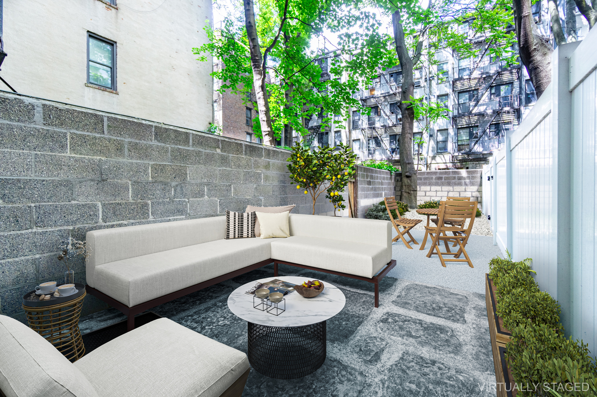 319 East 5th Street, Unit B Manhattan, NY 10003 - Photo 1 of 17 a view of a patio with couches table and chairs and potted plants
