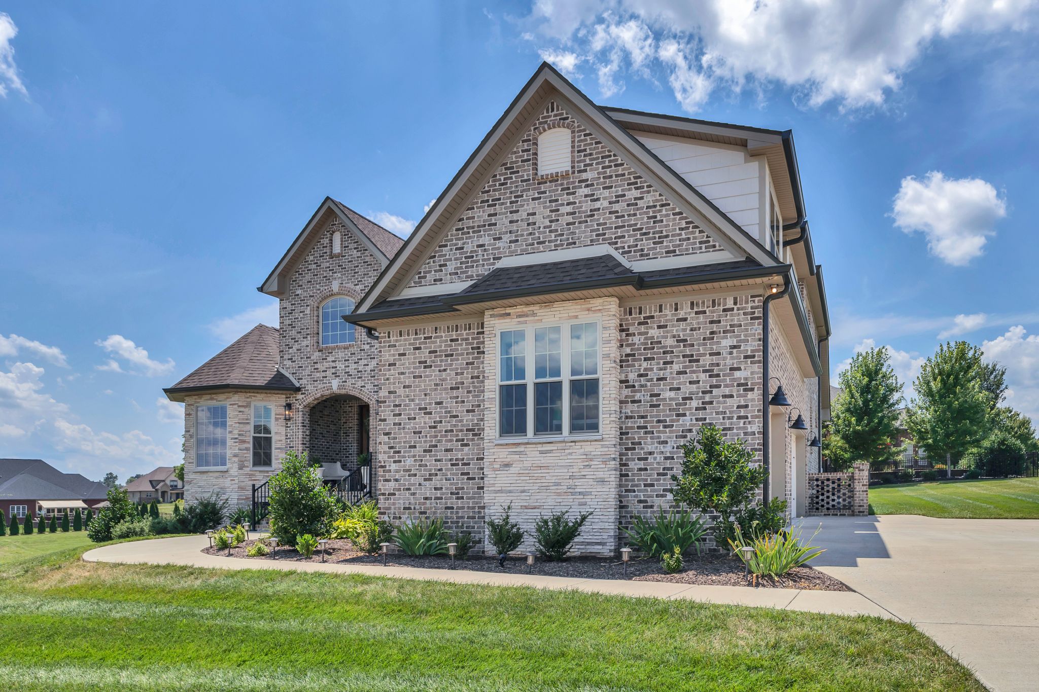 1484 Overlook Point Clarksville, TN 37043 - Photo 7 of 53 a front view of a house with a garden