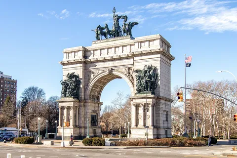 a view of a building with a clock on the top
