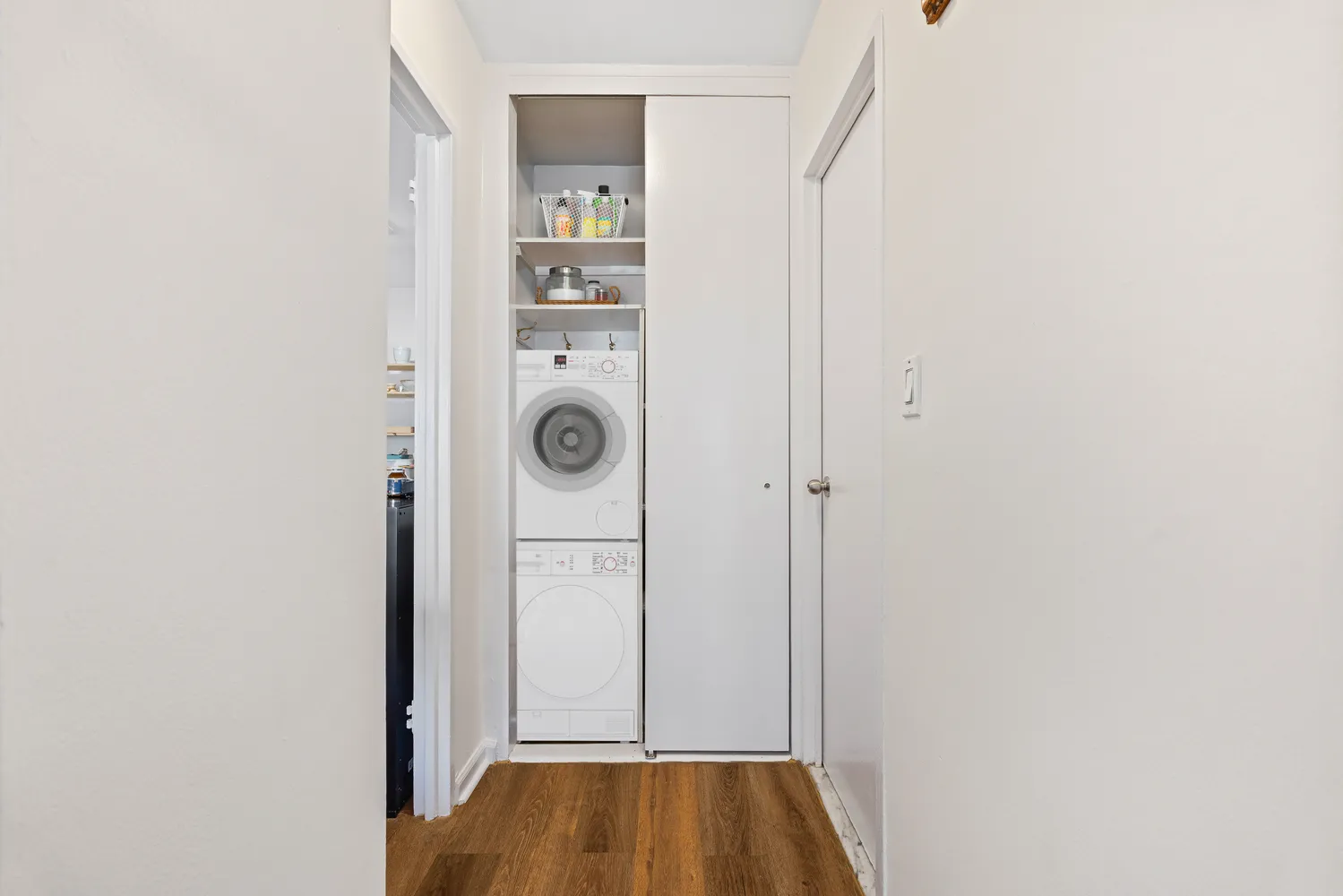 a view of a room that has a washer and dryer