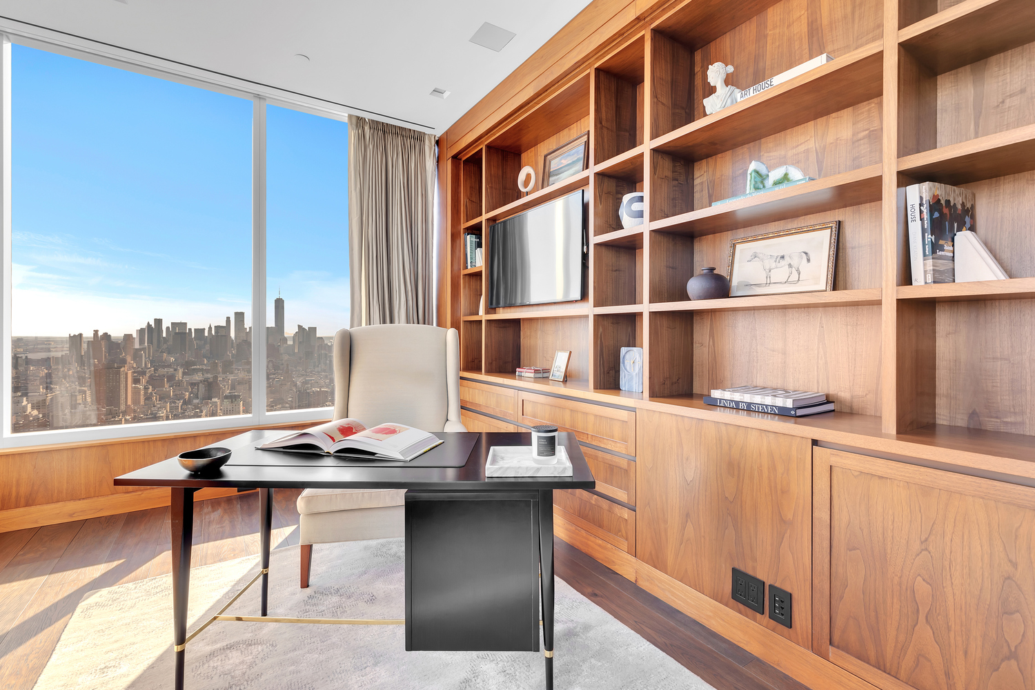 23 East 22nd Street, Unit PH Manhattan, NY 10010 - Photo 18 of 32 a table and chairs in front of a window