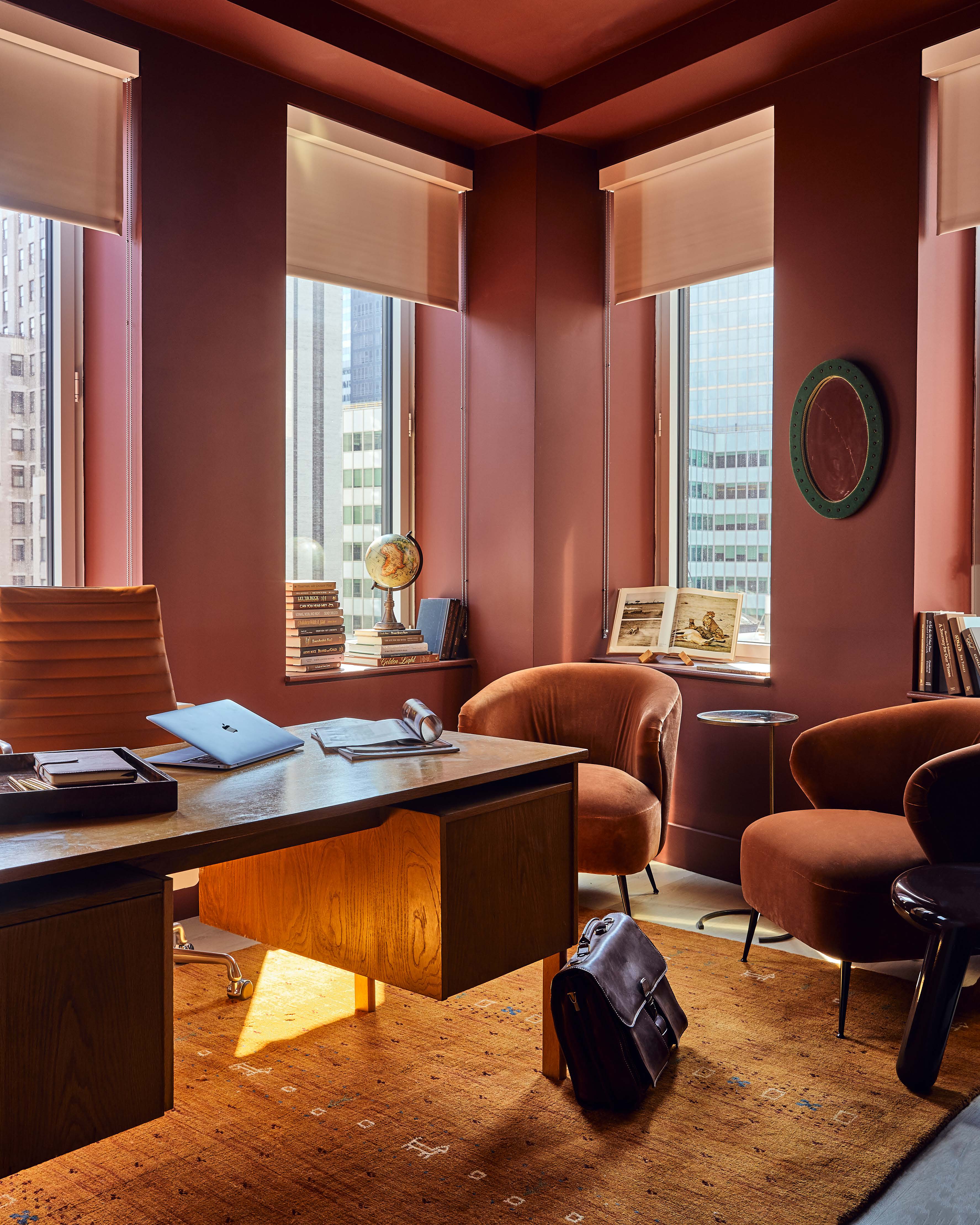 55 Broad Street, Unit 1007 Manhattan, NY 10004 - Photo 1 of 15 a bedroom with furniture and a window