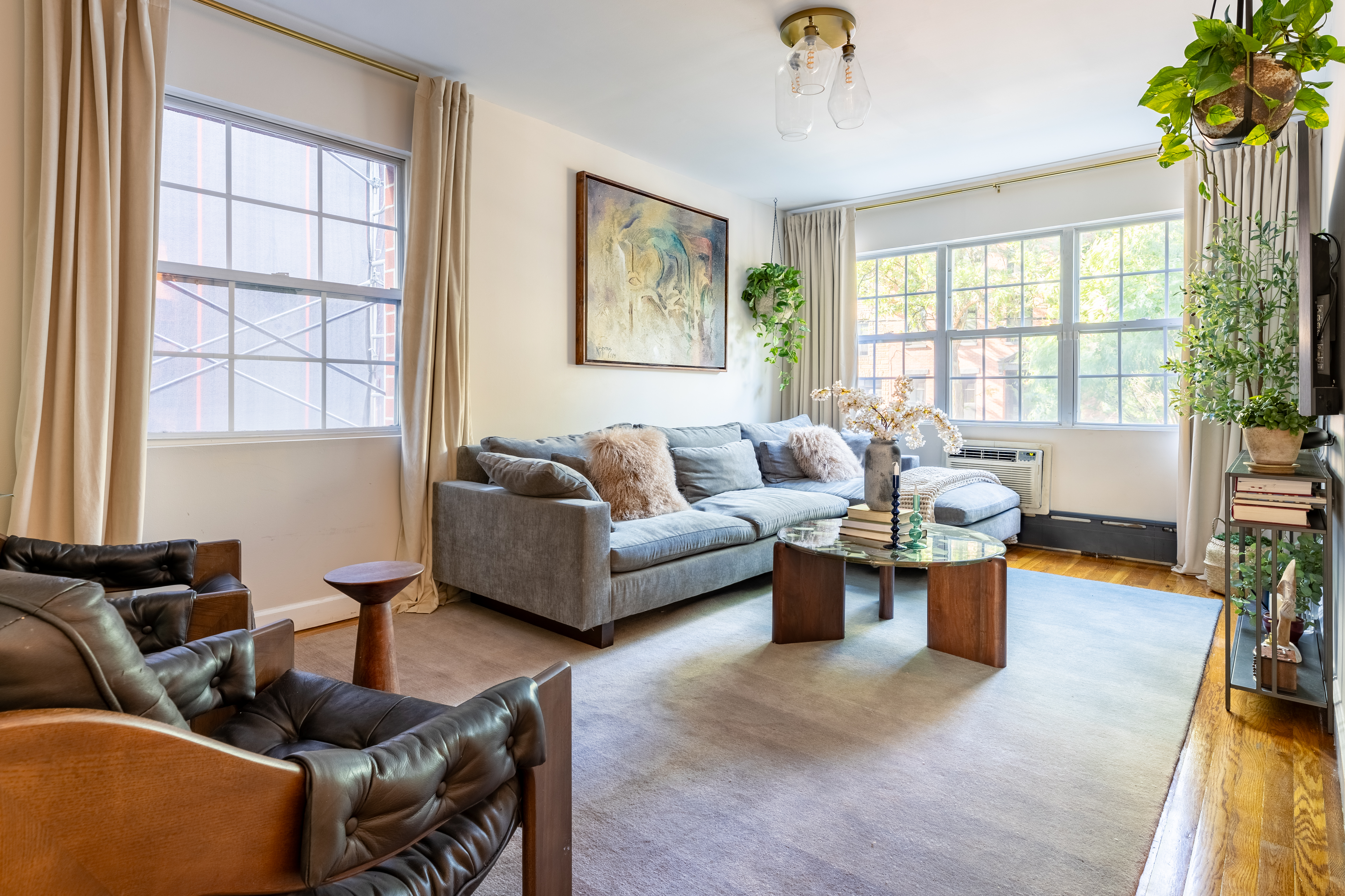 80 South 3rd Street, Unit 2 Brooklyn, NY 11249 - Photo 1 of 15 a living room with furniture and a large window