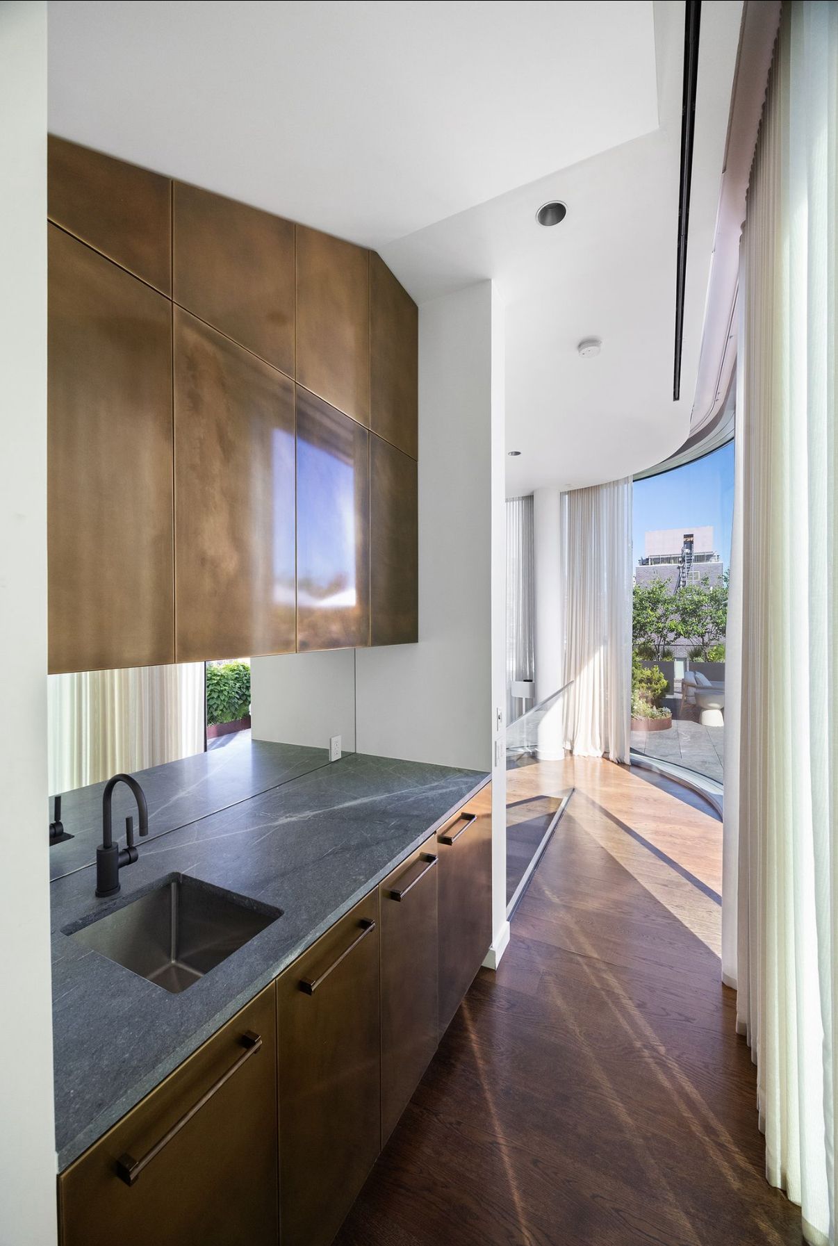 520 West 28th Street, Unit PH37 Manhattan, NY 10001 - Photo 34 of 45 a kitchen with a sink and a stove top oven