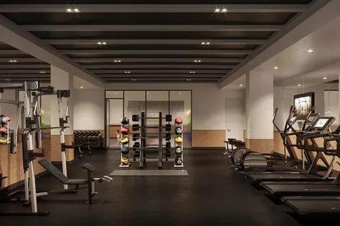 a view of a room with gym equipment