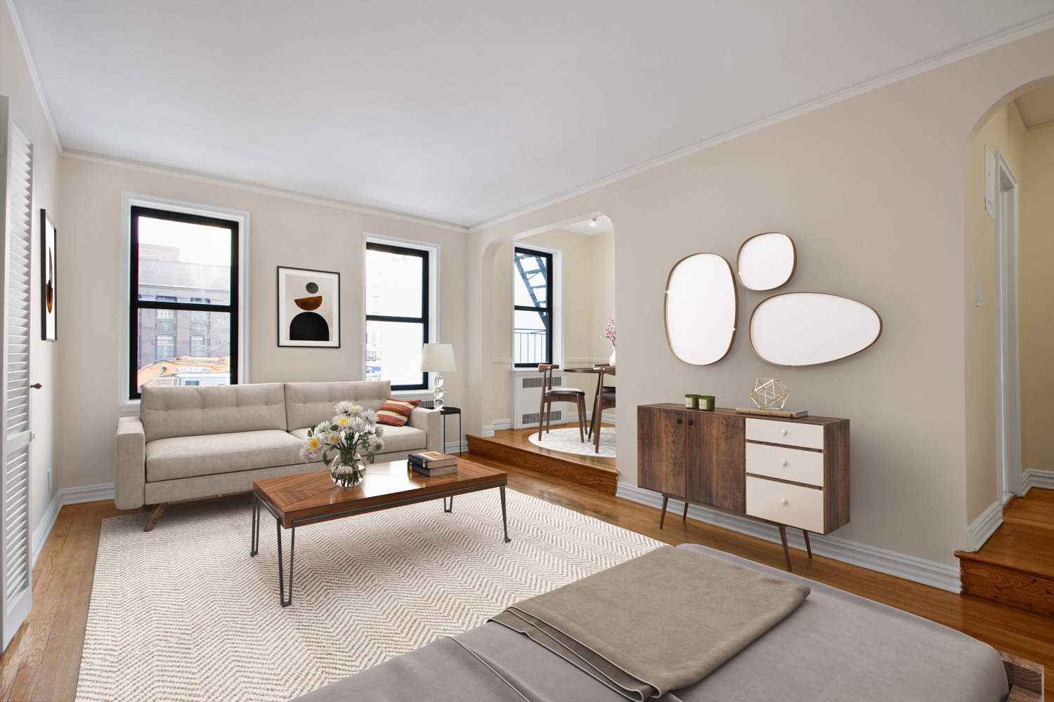 145 East 22nd Street, Unit 5G Manhattan, NY 10010 - Photo 1 of 5 a living room with furniture a rug potted plant and a window