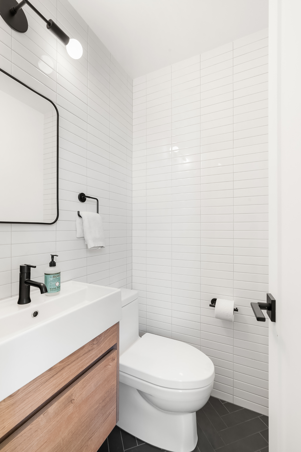 201 East 17th Street, Unit 16H Manhattan, NY 10003 - Photo 10 of 16 a bathroom with a sink a toilet and shower