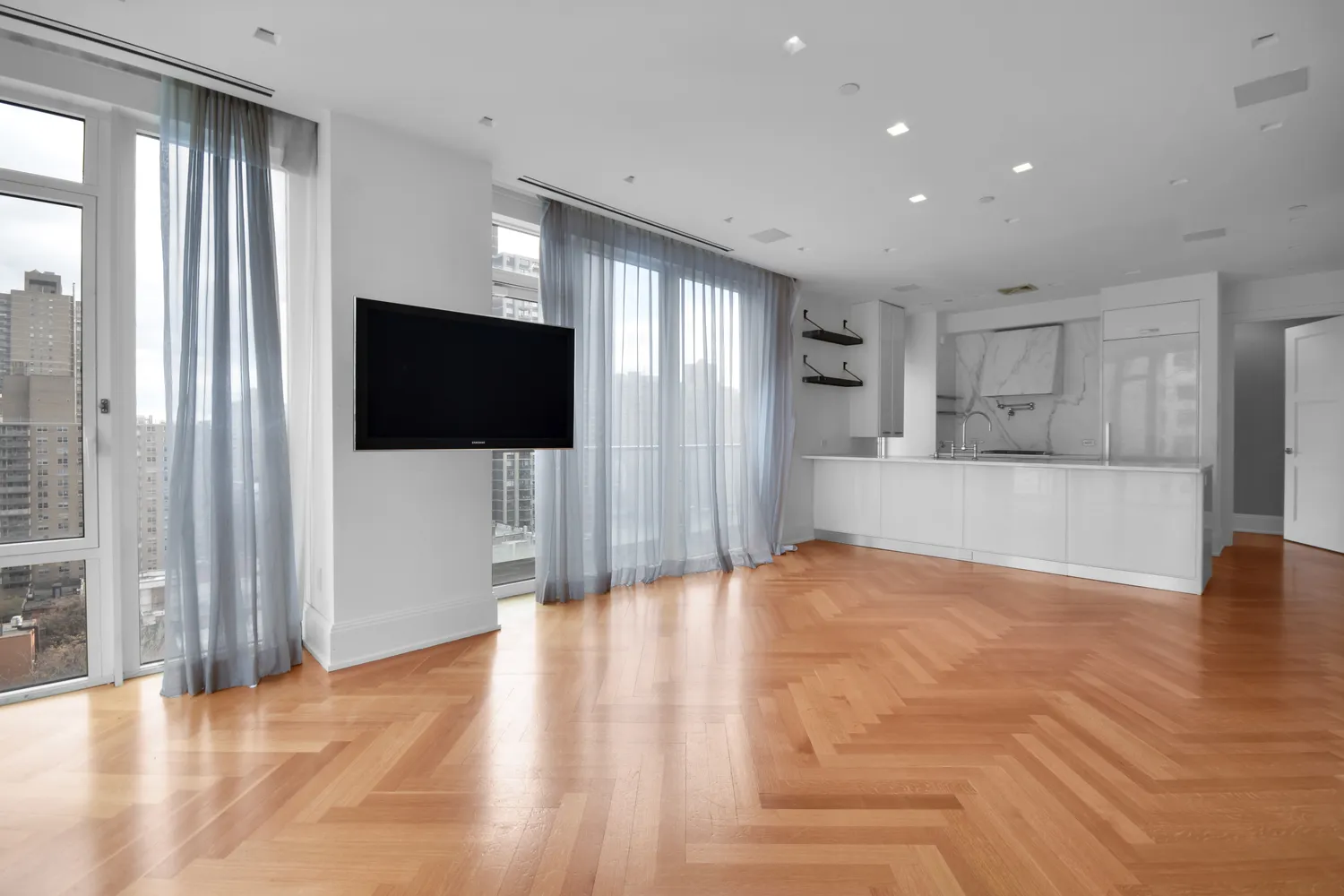 a view of a livingroom with a flat screen tv