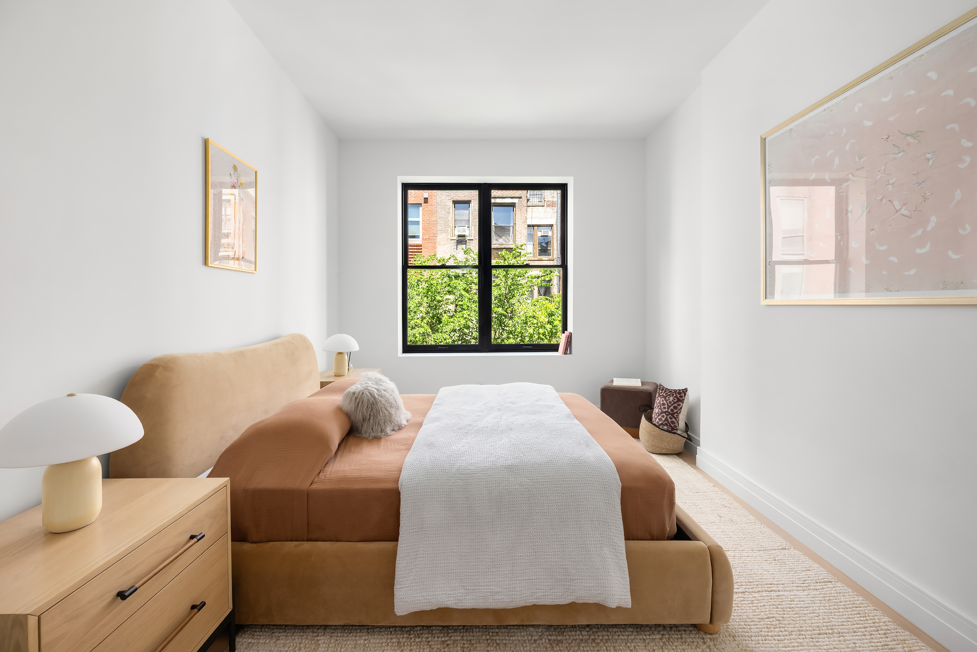 53 West 85th Street Manhattan, NY 10024 - Photo 24 of 37 a bed room with a bed and a window