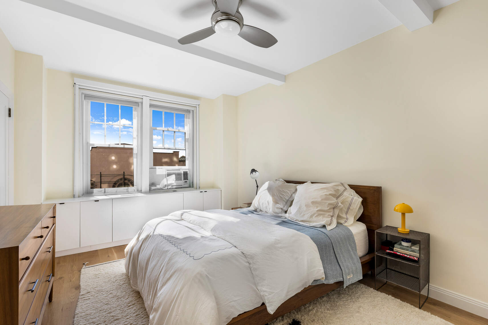 47 Plaza Street West, Unit 5B Brooklyn, NY 11217 - Photo 10 of 14 a bedroom with a bed and a tv