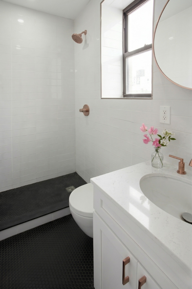 41 Clarkson Avenue, Unit 1H Brooklyn, NY 11226 - Photo 6 of 12 a bathroom with a sink and a toilet