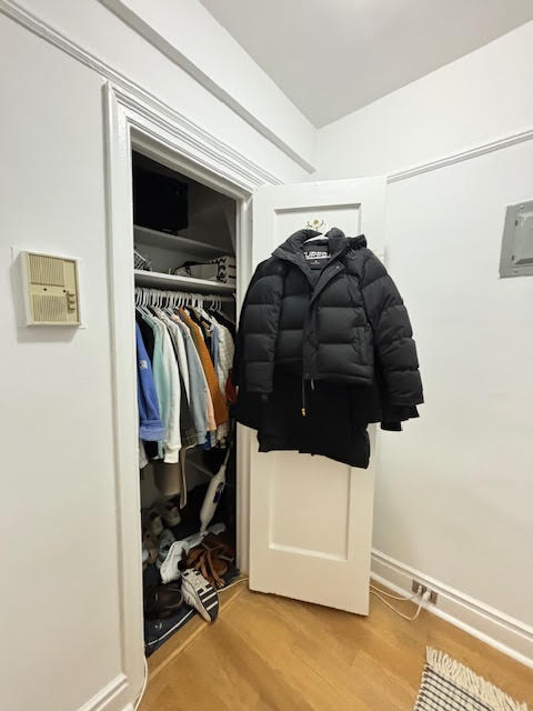 319 East 50th Street, Unit 10L Manhattan, NY 10022 - Photo 9 of 11 a view of walk in closet with clothes and shoes