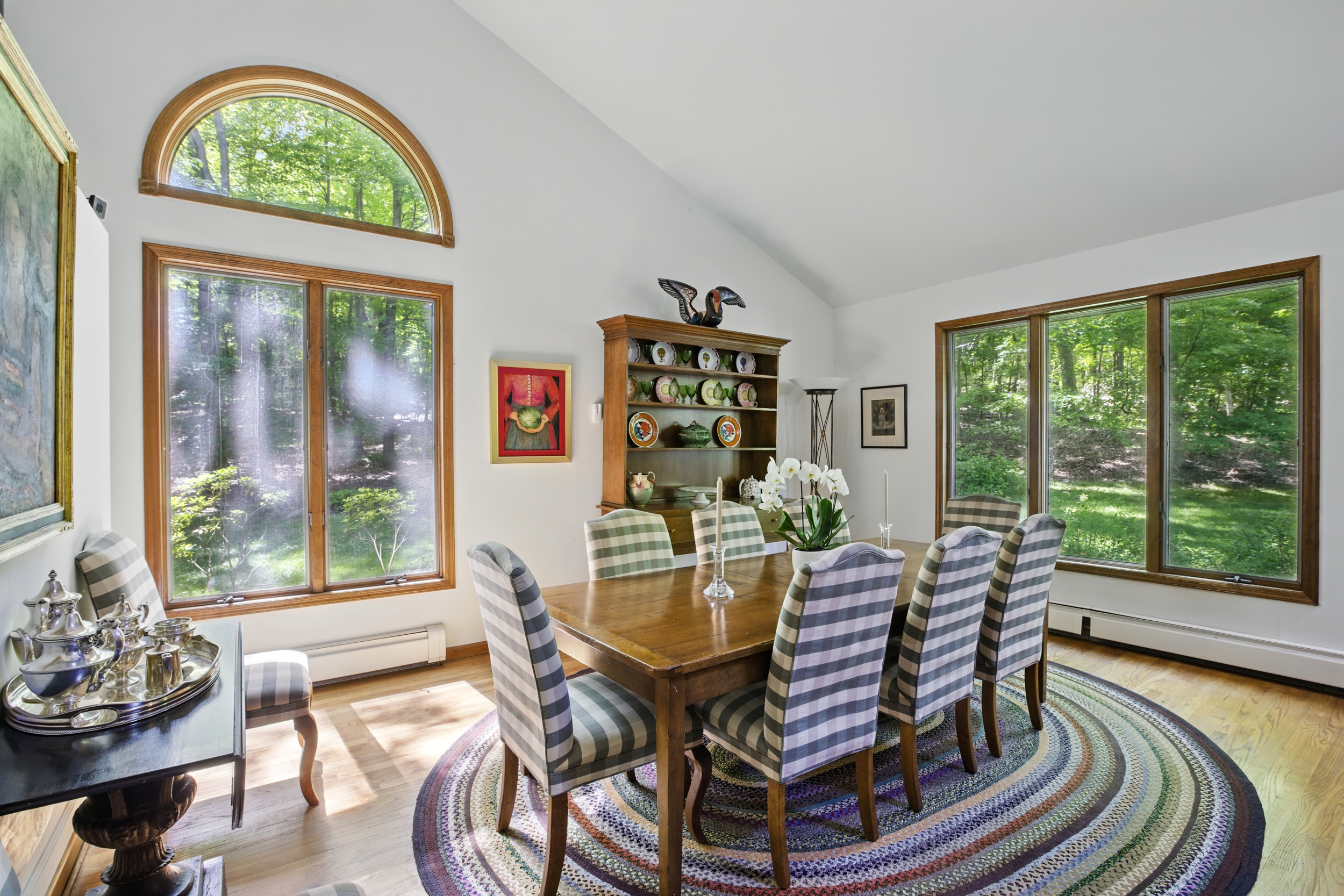 19 Pond Road Cold Spring, NY 10516 - Photo 9 of 32 a view of a dining room with furniture large windows and wooden floor