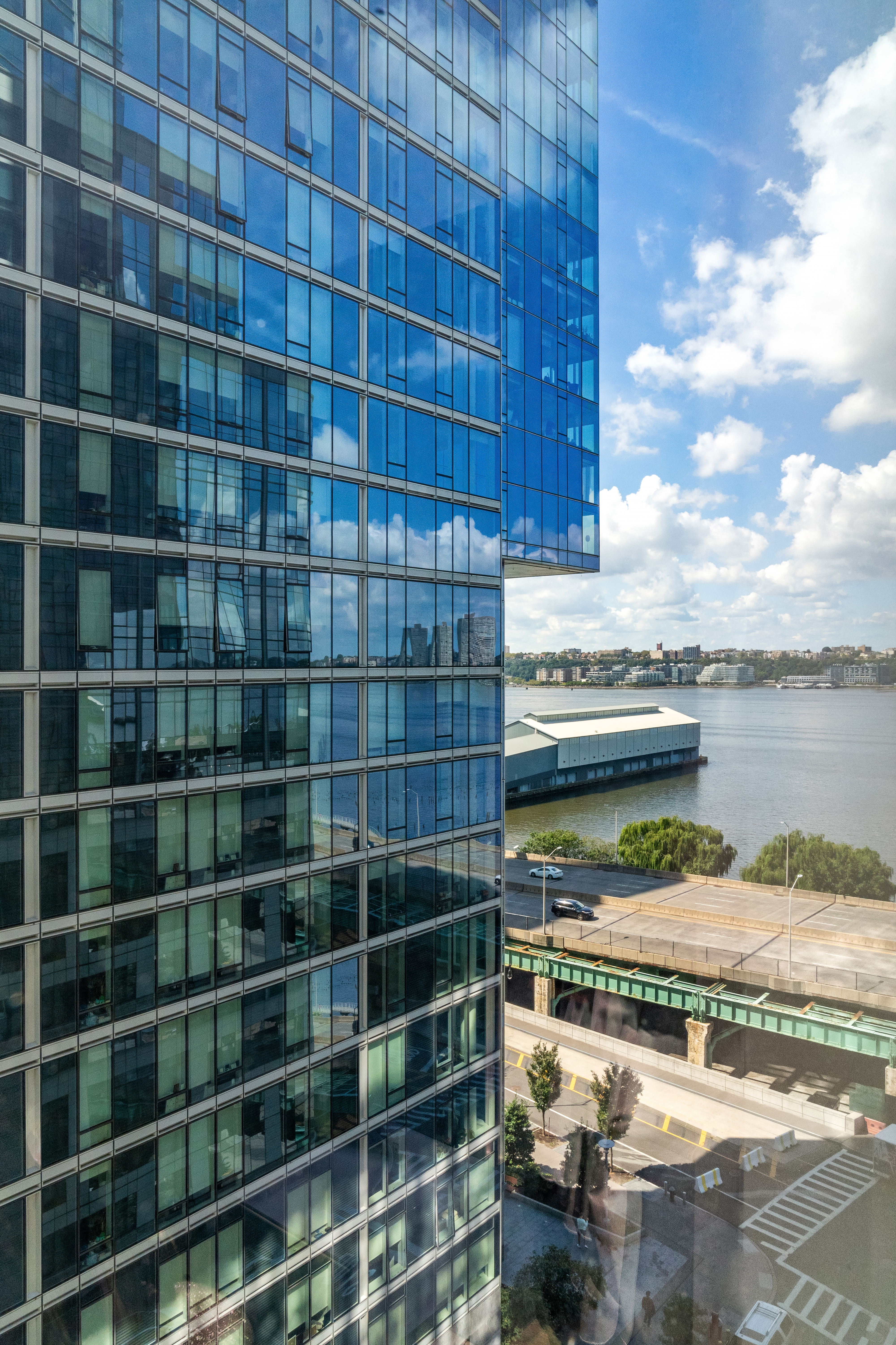 50 Riverside Boulevard, Unit 10P Manhattan, NY 10069 - Photo 15 of 21 a view of a lake with a car parked in front of it