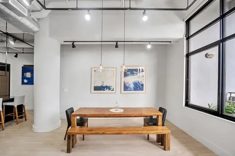 a bedroom with a bed and furniture