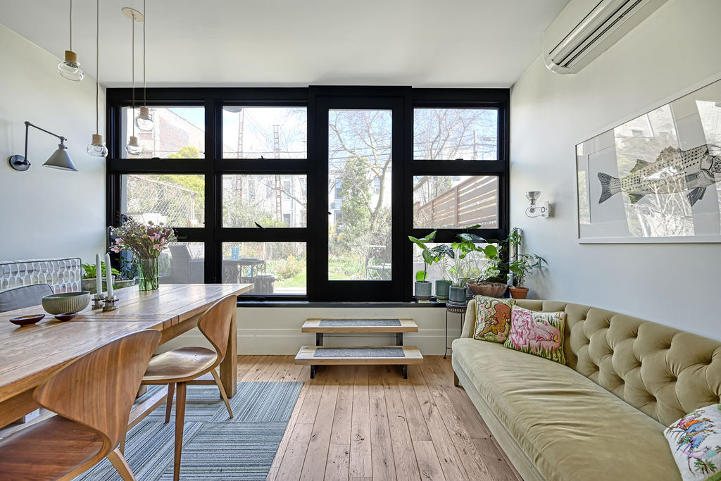 315 15th Street Brooklyn, NY 11215 - Photo 10 of 25 a living room with furniture and a large window