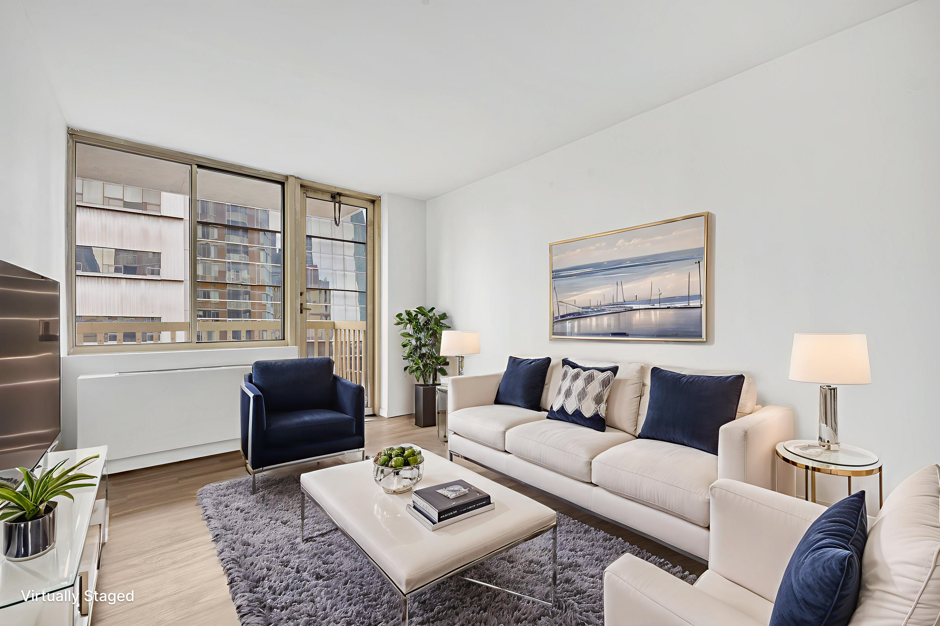 50 Lexington Avenue, Unit 10D Manhattan, NY 10010 - Photo 1 of 12 a living room with furniture and a table